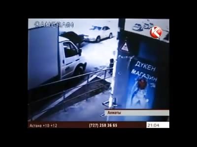 Young Boy walks in Front of Loading Dock as Truck is Pulling Out