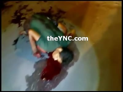 Man Stabbed to Death many times lies in Bizarre Position still on the Street