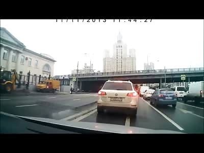 Clueless Pedestrian carrying Bag is Bagged on the Hood of an Oncoming Car