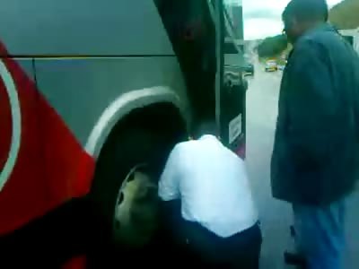 Motorcyclist is Crushed under Bus Still Alive Dying Slowly 