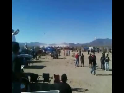 Spectator gets Airborne at Dirt Racing Event (Watch Slow Motion)