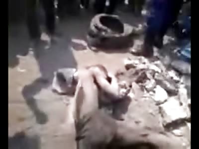 Guy Being Beaten Finally Gets Saved by Police with an AK-47 that Disperses the Crowd