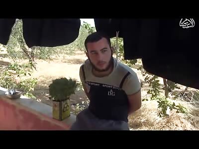 A Helping Hand....New Execution shows 2 men Holding the AK...... Victim is Preached to before being Murdered (Video is in HQ) 