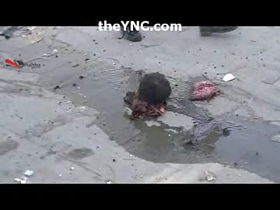 All That's Left of this Bomber is his Head and Brain Splatter