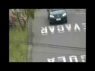 Criminals Fleeing Police Bowl over and Nearly Kill Couple on Motor Scooter