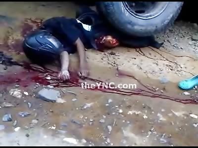 Motorcyclist is Crushed to Death under Giant Yellow Garbage ruck