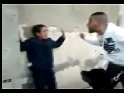 Muslim uses a Dog to Scare a Boy into Humiliation