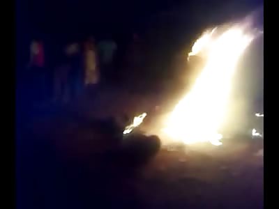 Man Burned Alive Face First in Fire...pulled out then Thrown back into the Fire