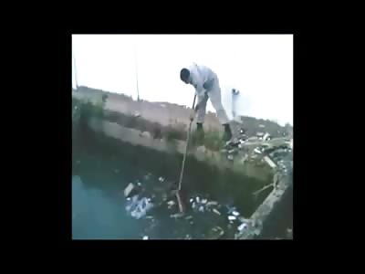 The Legs and Torso of a Dismembered Woman pulled from a Smelly Sewage Ditch