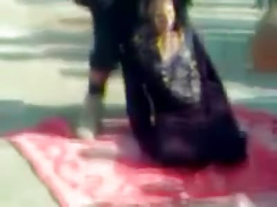 In a Bizarre Public Execution woman is Literally Strangled to Death