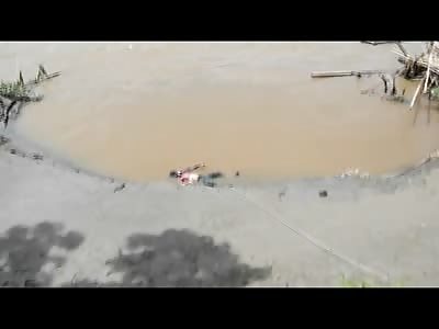 Putrefied Corpse Rotting in River