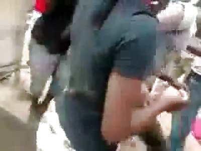 Crazy Chick Rips her Shirt off and Attacks her Boyfriend on a Busy Street