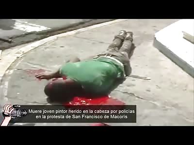 People watch as Boy shot in the Head Squirms on the Sidewalk until Help Arrives