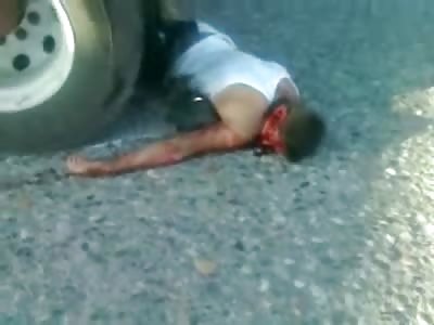 Truck is backed off of Man who left a Skid Mark on the Highway with his Body