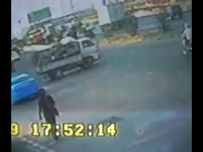Lucky Biker runs into Big Truck then almost gets Run over by pickup Truck