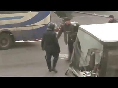 Today from Ukraine..Beheaded Body of Ukrainian Activist is Hauled away in the Street