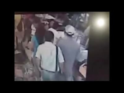 Man sitting at Pizza is Shot at Close Range..Dies underneath his Table