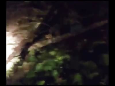 Thai Soldier Investigating a Small Device has his Foot Blown Off by that Device