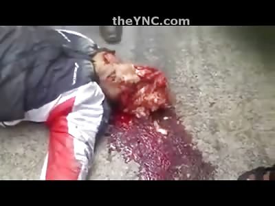 Palm Leaves are Removed to Reveal this Mans Gruesomely Crushed Head