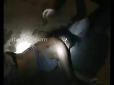 Stripping the Big Boobed Girl that Was Shot Dead Right Down to her Red Thongs