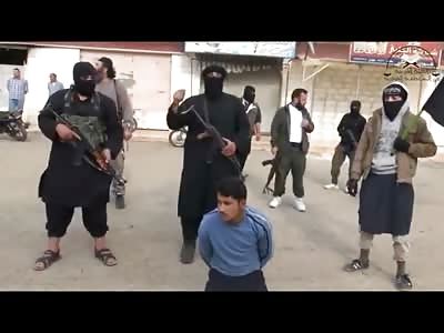 New Execution: Bored and Looking Around, Man is Killed with AK-47 Bullet through the Head while on his Knees