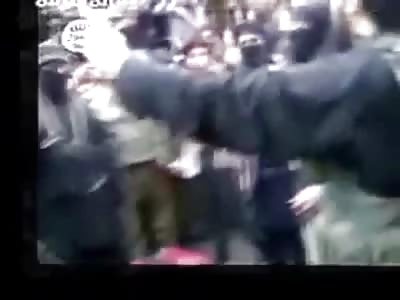 Circle Jerk Execution of Man in Red Shirt