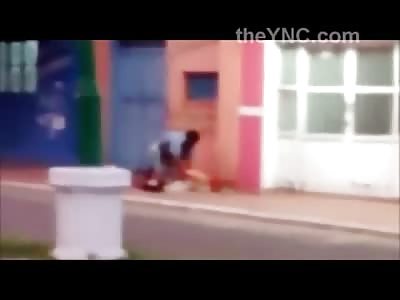 Deranged Man Calmly Hacks another Guys Head off with a Machete and Then Casually Walks off with His Head