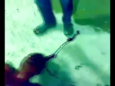 Man Shot in the Head Agonizing