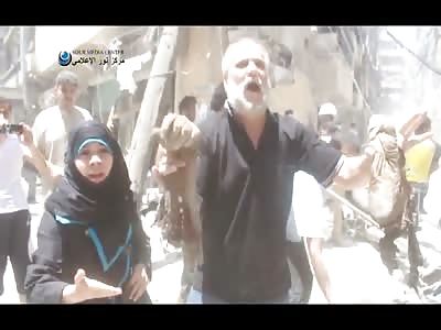 Gory Aftermath of Bombing in Aleppo, Syria..People holding Body Parts and Many Dead