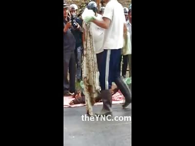 One Half of a Man is Left Under the Bus the Other is Taken Away