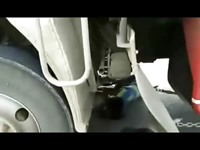 Little Boy Crushed under Truck with his Mother Beside Him Holding Him and Crying