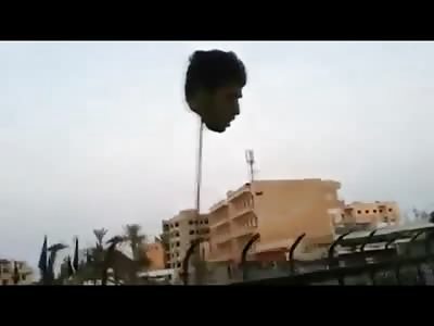 50 Soldiers Beheaded and their Heads put on Fence Spikes to Display to Everyone