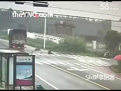 Motorcyclist Rams Head First into a Truck at an Intersection...It's like Hitting a Brick Wall