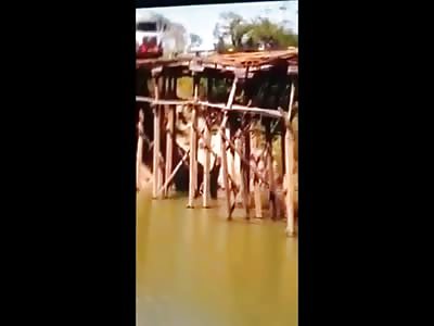 Fat Truck on a Little Bridge..Something Tells Me this is NOT Going to Work Out 