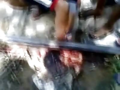 Man is Cut in Two Perfect Pieces by Train