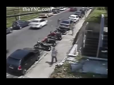 Man is Executed from Behind While Walking Down the Sidewalk 