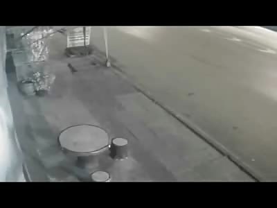 Crazy Man Attacks a Motorcycle with a Machete (Slow Motion Added)