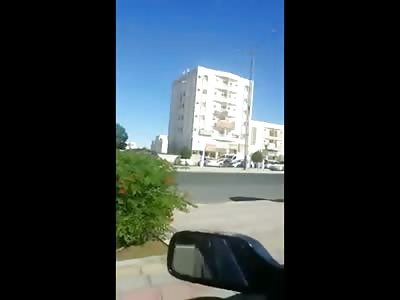 Two Angles Show Woman Trying to Hang on for Dear Life .... 