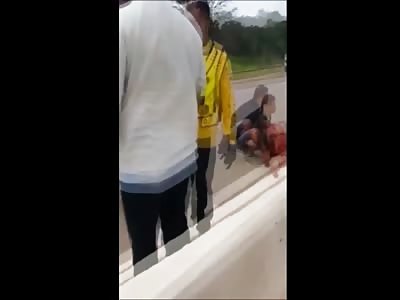 Bizarre Aftermath Video of Man with his Face Ripped Off after Accident trying to Talk in the Street 