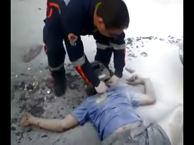 Man Lying in a Horrific Position 