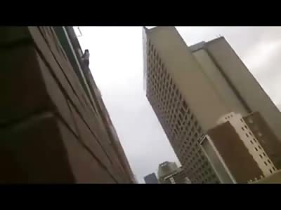 Brutal Suicide captured on Camera: Woman Ends it All Takes Giant Leap to her Death (Listen to the Impact)