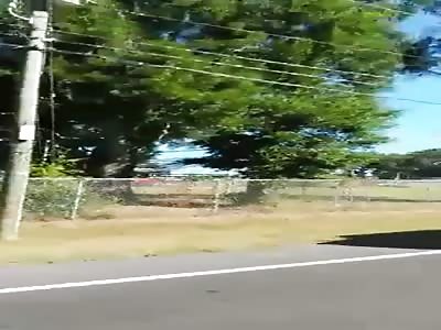 Just A Woman With A Gash In Her Neck, Walking Down The Road