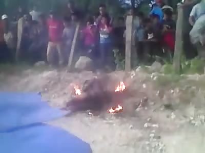 Kids watch lynching by gasoline: perfect 