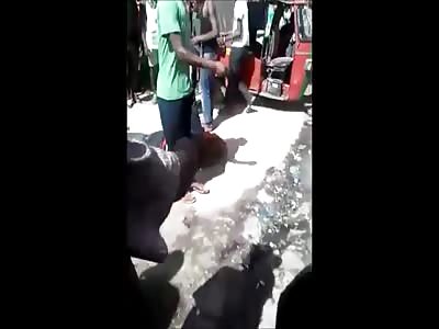 Meanwhile in Africa... Thief Gets Severely Punished by Angry Mob with Sticks and Stones (Children and Women Join to the Fun)