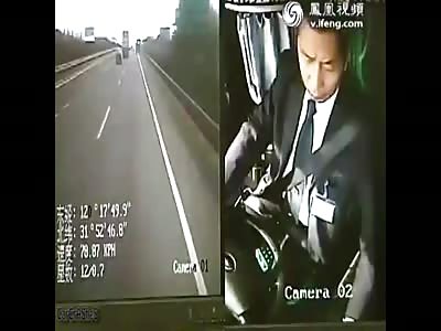 Bus hits truck while driver is checking text message