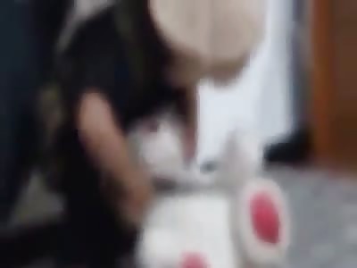 What a Dad!! ISIS Video shows Young Boy Practicing His Beheading Skills on a Teddy Bear!