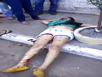 Girl Shot in the Face lies on the Sidewalk before her Death