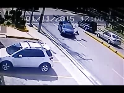 Rider Slides underneath Car Crushing his Head 