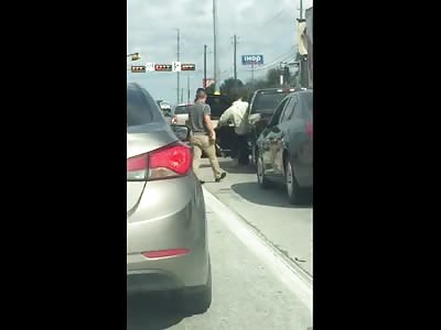 Road Rage in the USA..One has a Baseball Bat..One has a 2 by 4