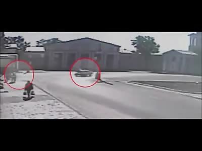 Two Boys on a Scooter Crash Head on into Car